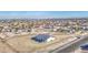 Expansive aerial view of a new home with generous surrounding land in a developing residential area at 30634 W Latham St, Buckeye, AZ 85326