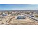 An aerial view of a single-Gathering home featuring desert landscaping and a paved driveway at 30634 W Latham St, Buckeye, AZ 85326