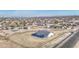 Expansive aerial view of a new home with generous surrounding land in a developing residential area at 30634 W Latham St, Buckeye, AZ 85326