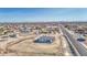 Expansive aerial view of a new home with generous surrounding land in a developing residential area at 30634 W Latham St, Buckeye, AZ 85326