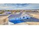 New construction featuring a stylish single-story home with a three-car garage in a developing neighborhood at 30634 W Latham St, Buckeye, AZ 85326