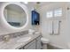 Bright bathroom features a granite vanity, modern lighting, and ample storage space at 4044 E Cascalote Dr, Cave Creek, AZ 85331