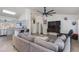 Open-concept living area with modern furnishings and natural light flowing in from the many windows at 4044 E Cascalote Dr, Cave Creek, AZ 85331