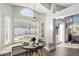 Bright breakfast nook featuring a round table, built-in seating and a large arched window offering natural light at 4805 E Monte Cristo Ave, Scottsdale, AZ 85254