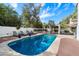 Beautiful pool area featuring a private pool, patio furniture, and serene landscaping at 4805 E Monte Cristo Ave, Scottsdale, AZ 85254