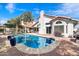 Stunning backyard showcasing a private pool, covered pergola, and charming landscaping at 4805 E Monte Cristo Ave, Scottsdale, AZ 85254