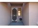 Welcoming front porch with decorative security door, small window and a potted plant adding a touch of charm at 4841 E Kirkland Rd, Phoenix, AZ 85054