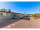 Lush backyard featuring a patio with BBQ and desert landscaping, perfect for outdoor entertaining and relaxation at 6224 E Decatur St, Mesa, AZ 85205
