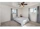 Inviting bedroom with neutral decor, soft natural light, and comfortable carpet at 6224 E Decatur St, Mesa, AZ 85205