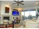 Comfortable living room with a fireplace and access to a patio, perfect for indoor-outdoor living at 7348 N Via Camello Del Norte -- # 223, Scottsdale, AZ 85258