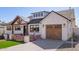 Inviting home featuring a paved driveway, attached two-car garage, and manicured front yard at 7525 E Latham St, Scottsdale, AZ 85257