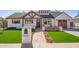 Charming home featuring a walkway, manicured landscaping, and welcoming front yard at 7525 E Latham St, Scottsdale, AZ 85257