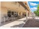 Covered patio with ample seating space and an awning to provide extra shade at 8303 E Monterey Ave, Mesa, AZ 85209