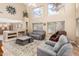 Bright living room featuring high ceilings and comfortable seating at 1043 W Washington Ave, Gilbert, AZ 85233