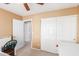 Bright room with multiple closets and a desk at 1043 W Washington Ave, Gilbert, AZ 85233