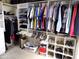 This spacious closet has lots of shelving for shoes, purses, and clothing at 10549 E Cedar Waxwing Dr, Sun Lakes, AZ 85248