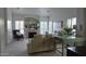 Bright living room featuring a fireplace, comfortable seating, and a stylish green accent table at 10549 E Cedar Waxwing Dr, Sun Lakes, AZ 85248