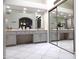 Bathroom featuring a dual sink vanity with plenty of counter space and an extra large walk-in closet at 10549 E Cedar Waxwing Dr, Sun Lakes, AZ 85248