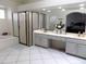 Bright and airy bathroom with a shower, tub, and a dual sink vanity with storage cabinets at 10549 E Cedar Waxwing Dr, Sun Lakes, AZ 85248