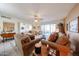 Comfortable living room with neutral colors, plush carpeting, and lots of light at 10846 N Fairway E Ct, Sun City, AZ 85351