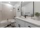 Cozy bathroom featuring a shower-tub combo, neutral colors, and modern fixtures at 11206 E Crescent Ave, Mesa, AZ 85208