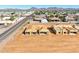 Aerial view of a home's new construction with beautiful mountain views in the distance at 11206 E Crescent Ave, Mesa, AZ 85208