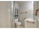 Cozy bathroom featuring a shower with glass door, and a well-lit vanity at 11407 N 111Th Ave, Sun City, AZ 85351