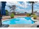 Backyard pool with patio and desert landscaping under a bright sunny sky at 13845 N 41St Ave, Phoenix, AZ 85053