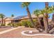 Single-Gathering home with mature landscaping and solar panels on the roof at 14718 W Ravenswood Dr, Sun City West, AZ 85375