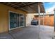 Spacious covered back patio featuring concrete flooring, access to the yard, and shelter from the elements at 1578 W Campbell Ave, Phoenix, AZ 85015