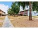 Image of community townhomes with a sidewalk and landscaping at 1578 W Campbell Ave, Phoenix, AZ 85015