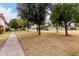 Charming community with mature trees lining the street, sidewalk access, offering a serene neighborhood setting at 1578 W Campbell Ave, Phoenix, AZ 85015