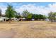 Expansive green space within the community, enhanced by mature trees, offering room for outdoor activities at 1578 W Campbell Ave, Phoenix, AZ 85015