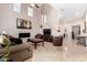 Inviting living room with fireplace, high ceiling and travertine flooring at 16600 N Thompson Peak Pkwy # 1052, Scottsdale, AZ 85260