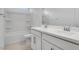 Bright bathroom features double vanity, quartz countertops, and shower/tub combo at 16778 W Yucatan Dr, Surprise, AZ 85378