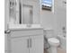 Bathroom featuring white cabinetry, a single sink, quartz countertops, and a shower/tub combo at 16778 W Yucatan Dr, Surprise, AZ 85378