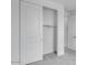 Bedroom closet with sliding door, neutral-colored walls, and carpeting at 16778 W Yucatan Dr, Surprise, AZ 85378