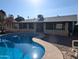 Inviting backyard oasis featuring a sparkling pool and outdoor space for relaxation and entertainment at 1708 E Wesleyan Dr, Tempe, AZ 85282