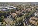 An aerial view of the condominiums, pool and surrounding landscaping at 1905 E University Dr # 219, Tempe, AZ 85288