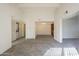 Expansive living room with a view into the dining area, enhancing the home's open layout at 1905 E University Dr # 219, Tempe, AZ 85288