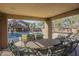 Lounge area with dining and plenty of chairs situated next to a refreshing pool at 1905 E University Dr # 219, Tempe, AZ 85288