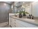 Elegant bathroom featuring a double vanity, quartz countertop, and walk-in shower at 2121 W Sonoran Desert Dr # 41, Phoenix, AZ 85085