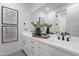 Elegant bathroom featuring double vanity, sleek fixtures, and decorative accents at 2121 W Sonoran Desert Dr # 41, Phoenix, AZ 85085