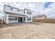 A view of the rear of the house from the partially landscaped backyard at 21250 E Sparrow Dr, Queen Creek, AZ 85142