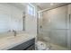 Modern bathroom featuring a glass enclosed shower and neutral tones, for a spa-like experience at 21250 E Sparrow Dr, Queen Creek, AZ 85142