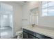 Bathroom vanity with modern fixtures and a view of the shower at 21250 E Sparrow Dr, Queen Creek, AZ 85142