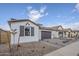 Lovely home featuring desert landscaping, neutral colors, and a two-car garage at 21250 E Sparrow Dr, Queen Creek, AZ 85142