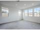 Spacious living room with recessed lighting and natural light from several large windows at 21250 E Sparrow Dr, Queen Creek, AZ 85142