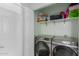 Conveniently located laundry room with modern washer and dryer at 2331 E Evans Dr, Phoenix, AZ 85022