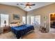 Bright and airy bedroom with vaulted ceiling, ceiling fan, and large windows at 24204 N 27Th Pl, Phoenix, AZ 85024